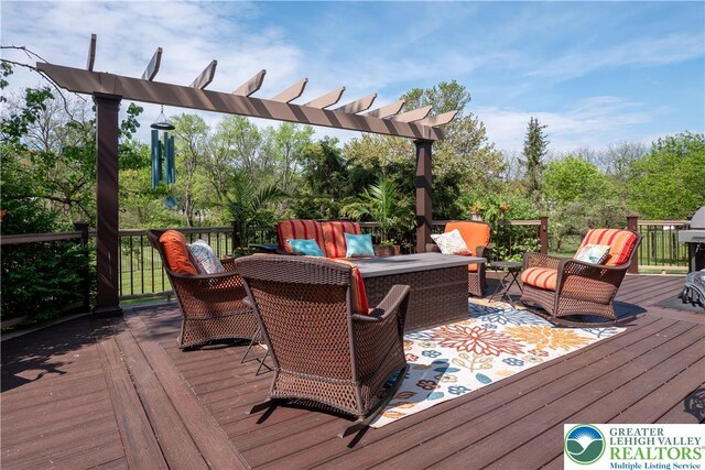 1560 Surrey Rd, Lower Saucon Twp, PA 18015 - deck with outdoor lounge area, a pergola, and view of wooded area