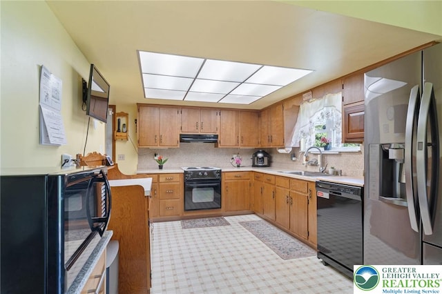 94 Brader Dr, Luzerne, PA 18705 - kitchen featuring dishwasher, stainless steel fridge with ice dispenser, range with electric cooktop, a sink, and under cabinet range hood