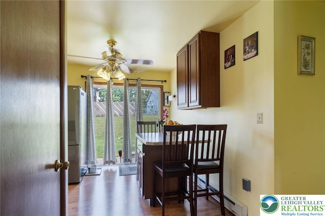 94 Brader Dr, Luzerne, PA 18705 - dining space featuring a ceiling fan and wood finished floors
