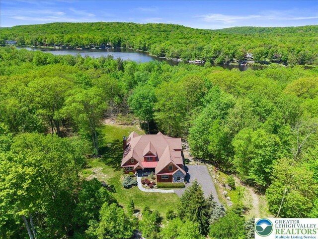 127 Timber Lake Dr, Barrett Twp, PA 18325 - view of subject property featuring a heavily wooded area and a nearby body of water