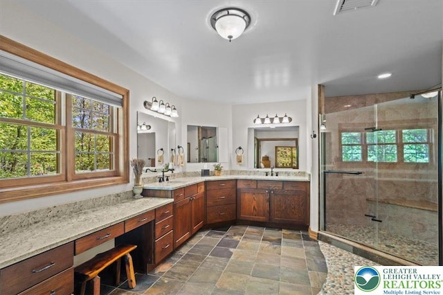 127 Timber Lake Dr, Barrett Twp, PA 18325 - bathroom with a shower stall, vanity, and stone finish flooring