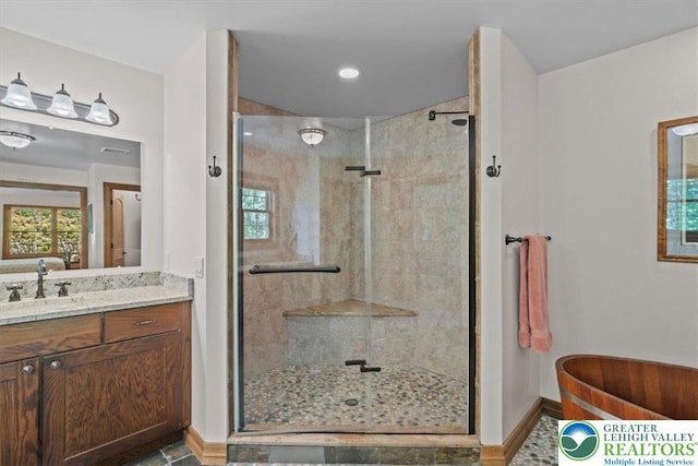127 Timber Lake Dr, Barrett Twp, PA 18325 - bathroom with vanity, a shower stall, baseboards, and recessed lighting