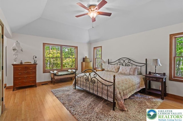 127 Timber Lake Dr, Barrett Twp, PA 18325 - bedroom with wood finished floors, baseboards, lofted ceiling, and a ceiling fan
