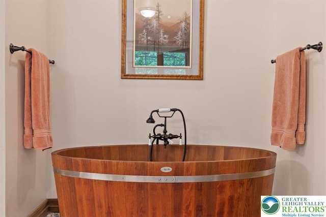 127 Timber Lake Dr, Barrett Twp, PA 18325 - full bath featuring a freestanding tub