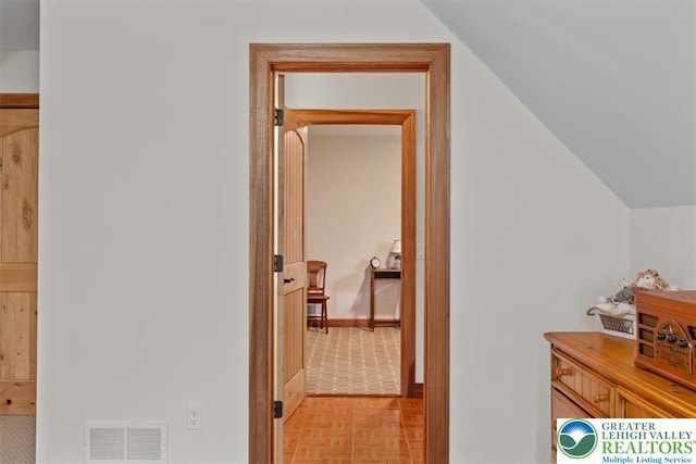 127 Timber Lake Dr, Barrett Twp, PA 18325 - corridor with light colored carpet and lofted ceiling