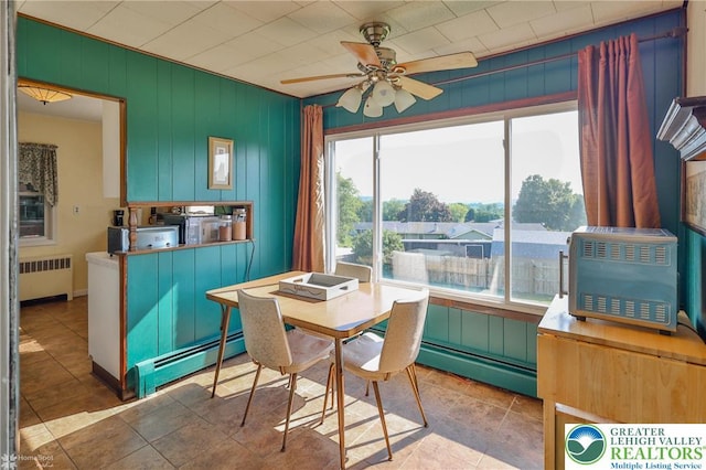 6386 Sullivan Trl, Plainfield Twp, PA 18091 - dining space featuring radiator, a baseboard heating unit, and healthy amount of natural light