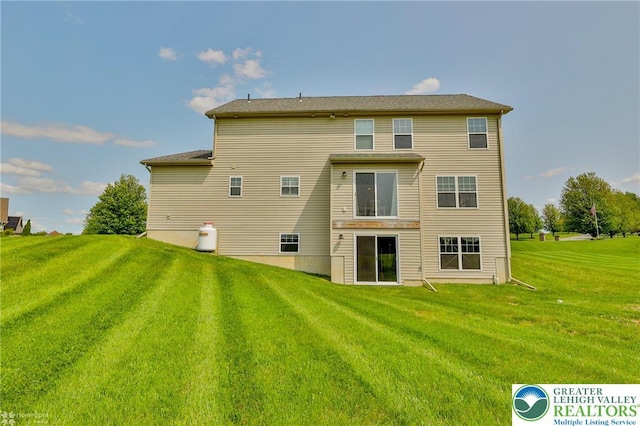 217 E Dell Rd, Moore Twp, PA 18014 - back of house featuring a yard