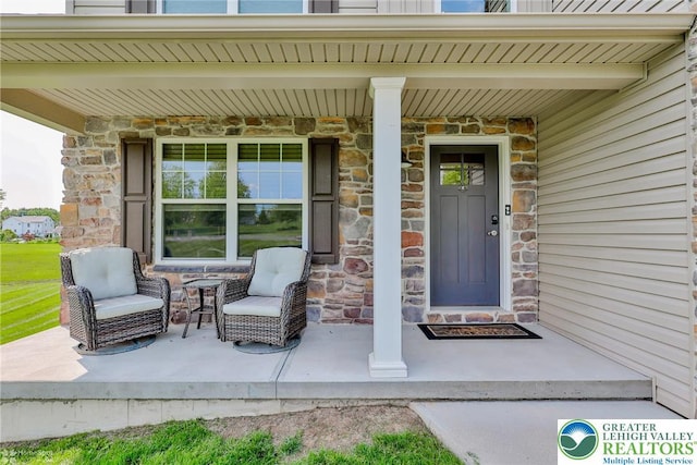 217 E Dell Rd, Moore Twp, PA 18014 - property entrance with a porch and stone siding