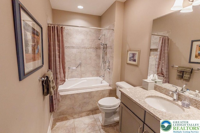 1069 Resolution Dr, Bethlehem City, PA 18017 - bathroom featuring tiled shower / bath combo, vanity, and tile patterned flooring