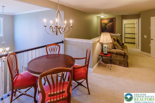 1069 Resolution Dr, Bethlehem City, PA 18017 - dining space with a chandelier, carpet, and crown molding
