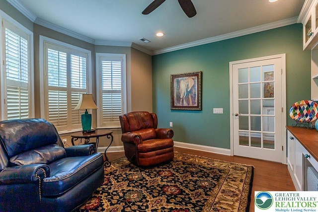 1069 Resolution Dr, Bethlehem City, PA 18017 - sitting room featuring wood finished floors, ceiling fan, crown molding, and recessed lighting