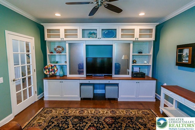 1069 Resolution Dr, Bethlehem City, PA 18017 - home office with built in desk, crown molding, dark wood-type flooring, ceiling fan, and recessed lighting