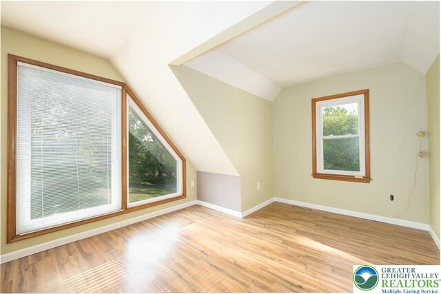 68 Knoll Cir, Boyertown, PA 19512 - bonus room with lofted ceiling, light wood-style flooring, and baseboards