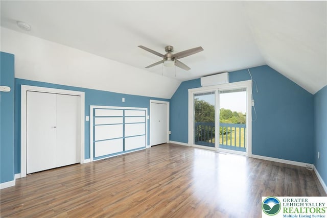 68 Knoll Cir, Boyertown, PA 19512 - bonus room featuring lofted ceiling, ceiling fan, wood finished floors, baseboards, and a wall unit AC