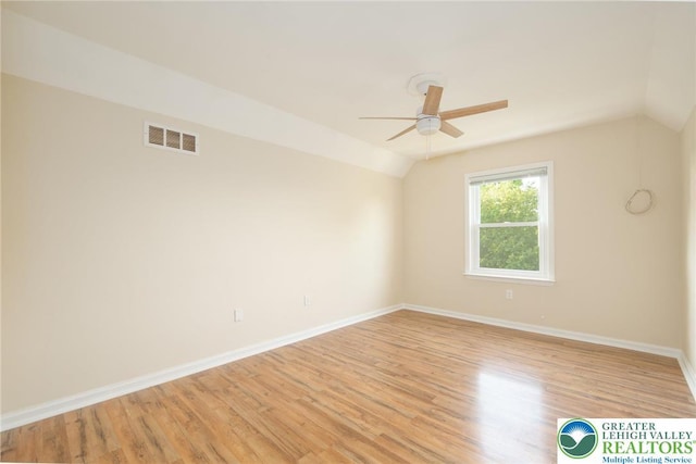 68 Knoll Cir, Boyertown, PA 19512 - unfurnished room featuring lofted ceiling, light wood-style flooring, a ceiling fan, and baseboards