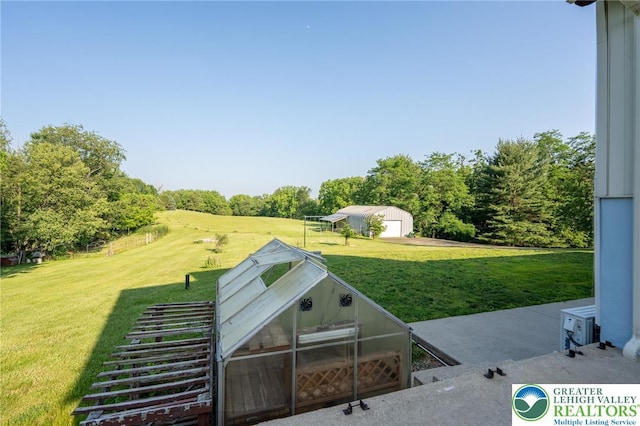 68 Knoll Cir, Boyertown, PA 19512 - view of grassy yard with an outdoor structure