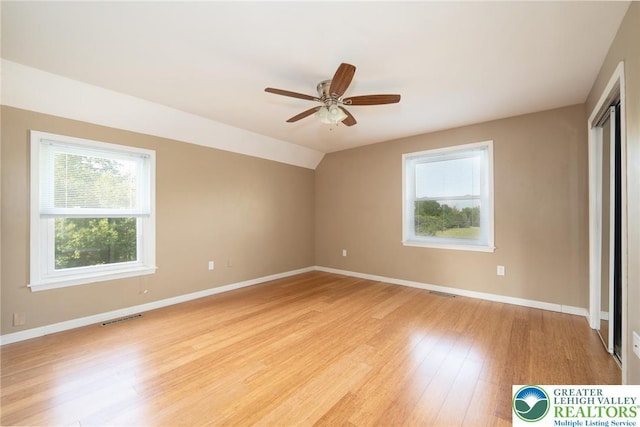 68 Knoll Cir, Boyertown, PA 19512 - unfurnished bedroom with multiple windows, light wood-type flooring, and baseboards