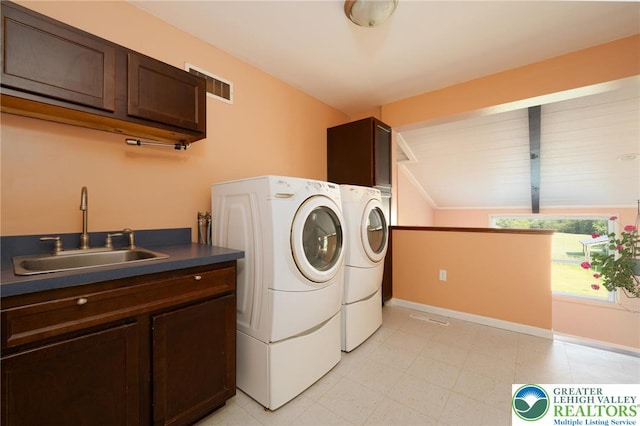 68 Knoll Cir, Boyertown, PA 19512 - washroom with separate washer and dryer, baseboards, and cabinet space