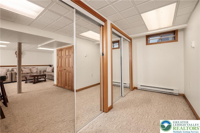 990 Hill Dr, Lower Macungie Twp, PA 18103 - basement featuring a baseboard radiator, baseboards, and carpet flooring