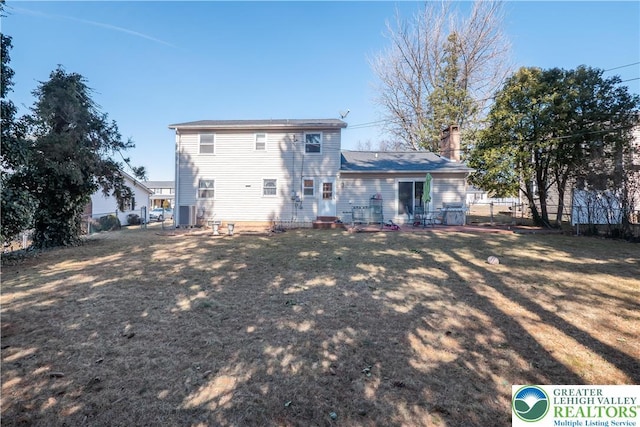 990 Hill Dr, Lower Macungie Twp, PA 18103 - rear view of property with a chimney