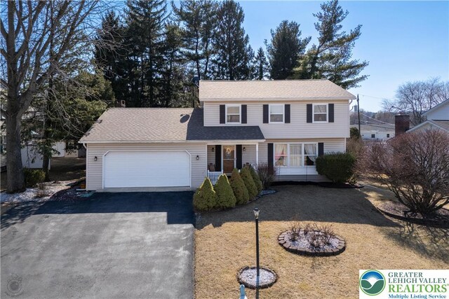 990 Hill Dr, Lower Macungie Twp, PA 18103 - view of front facade with driveway and an attached garage