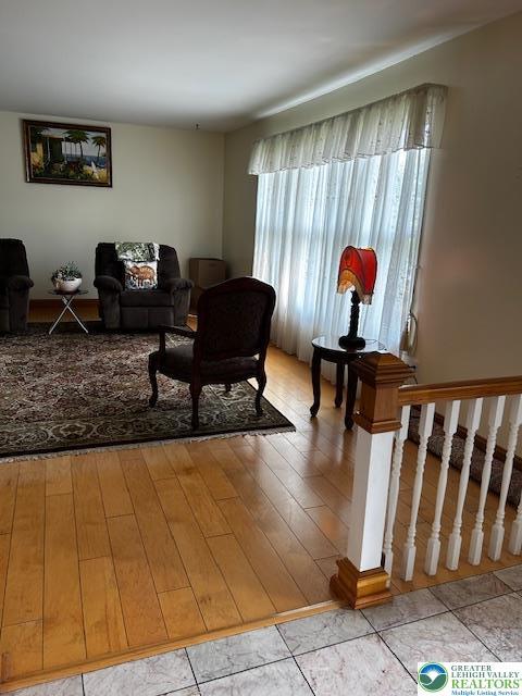 990 Hill Dr, Lower Macungie Twp, PA 18103 - living area with light wood-style flooring