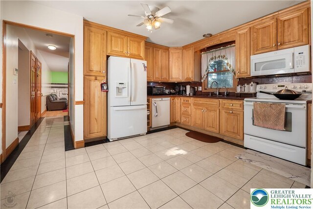 990 Hill Dr, Lower Macungie Twp, PA 18103 - kitchen with white appliances, backsplash, a ceiling fan, and dark countertops