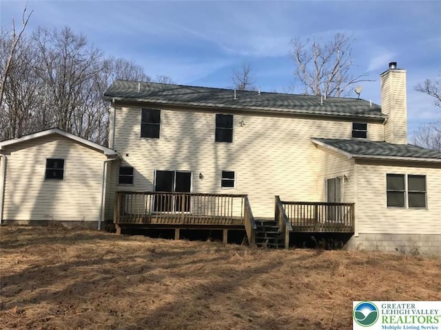 271 St Andrews Dr, Middle Smithfield Twp, PA 18324 - rear view of property featuring a chimney and a wooden deck