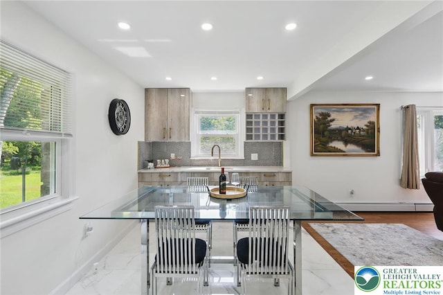 116 Peechatka, Pocono Twp, PA 18332 - kitchen featuring marble look tiles, recessed lighting, backsplash, a baseboard radiator, and baseboards