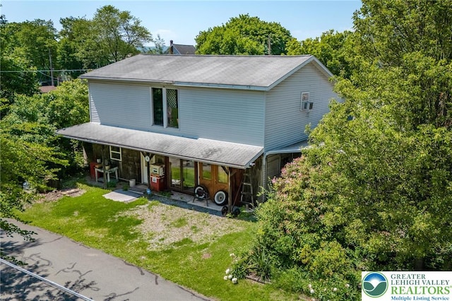 150 Lehigh St, Franklin Twp, PA 18235 - view of front of property featuring a porch, a front lawn, and a shingled roof