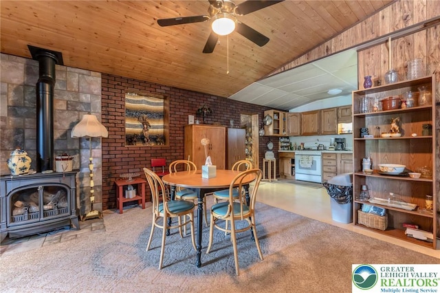 150 Lehigh St, Franklin Twp, PA 18235 - dining room with a wood stove, a ceiling fan, lofted ceiling, and wooden ceiling