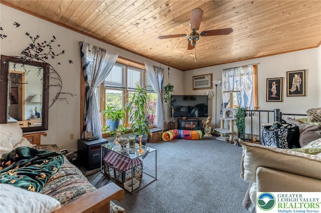 150 Lehigh St, Franklin Twp, PA 18235 - living area with wooden ceiling, carpet floors, a wood stove, a ceiling fan, and crown molding