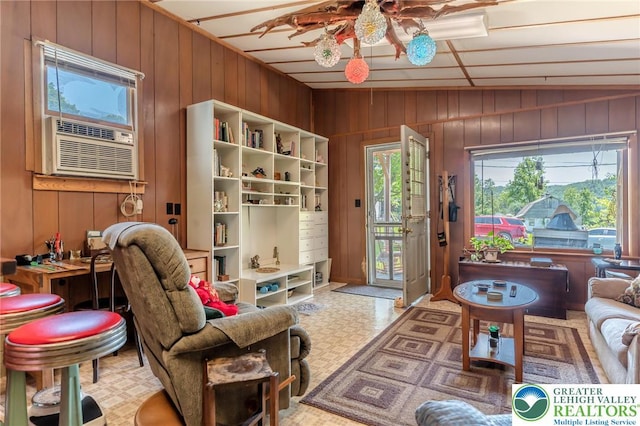 150 Lehigh St, Franklin Twp, PA 18235 - living area featuring a ceiling fan, wooden walls, tile patterned floors, and cooling unit