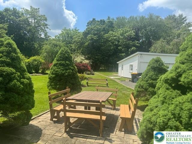 1512 River Rd, Bridgeton Twp, PA 18972 - surrounding community with outdoor dining space, a patio, and a yard