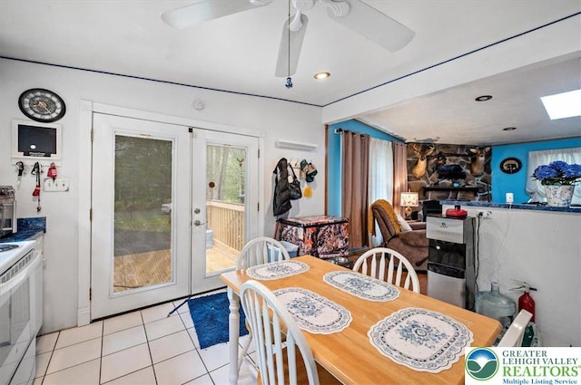 138 Drakes Dr, Penn Forest Twp, PA 18229 - dining space featuring french doors, light tile patterned floors, and ceiling fan