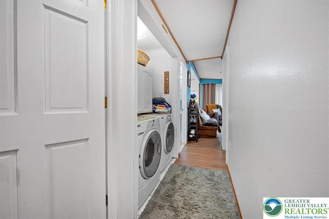 138 Drakes Dr, Penn Forest Twp, PA 18229 - laundry room with washer and dryer and light wood finished floors