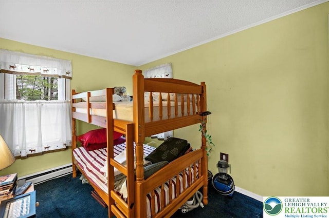 138 Drakes Dr, Penn Forest Twp, PA 18229 - carpeted bedroom featuring a baseboard radiator and crown molding