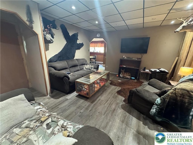 2330 Long Run Rd, Franklin Twp, PA 18235 - living area with arched walkways, wood finished floors, recessed lighting, a drop ceiling, and baseboards
