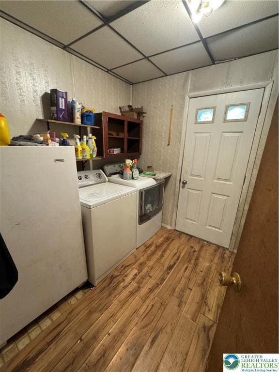 2330 Long Run Rd, Franklin Twp, PA 18235 - laundry area with light wood-style floors and independent washer and dryer