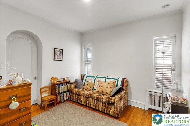 923 N Webster, Lackawanna, PA 18510 - living room featuring crown molding, wood finished floors, and arched walkways