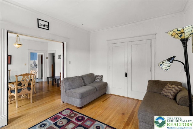 923 N Webster, Lackawanna, PA 18510 - living area with crown molding and light wood-type flooring
