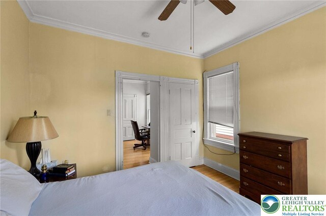 923 N Webster, Lackawanna, PA 18510 - bedroom with ornamental molding, wood finished floors, baseboards, and a ceiling fan