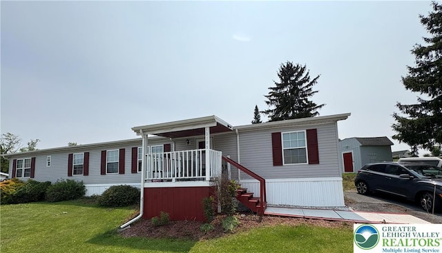 10188 Cork Ln, Upper Macungie Twp, PA 18031 - manufactured / mobile home featuring a front lawn