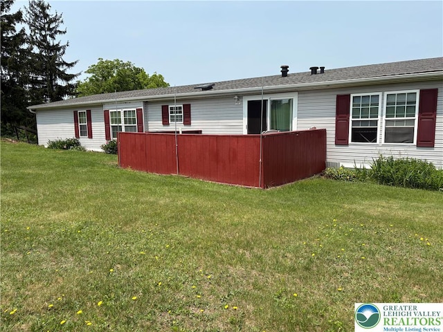 10188 Cork Ln, Upper Macungie Twp, PA 18031 - rear view of property featuring a lawn