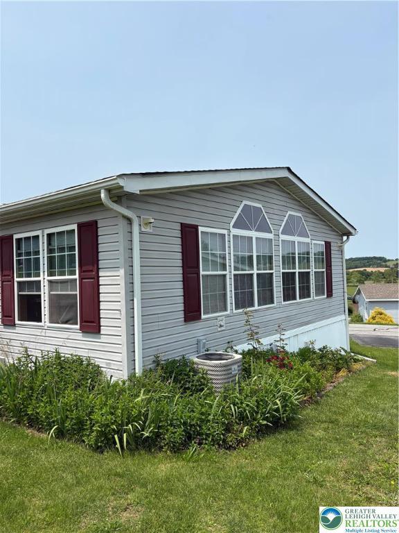 10188 Cork Ln, Upper Macungie Twp, PA 18031 - view of side of home with a lawn