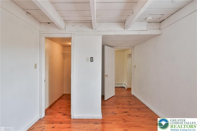 3679 Friedens Rd, Washington Twp, PA 18080 - corridor with a baseboard heating unit, beam ceiling, light wood finished floors, and baseboards