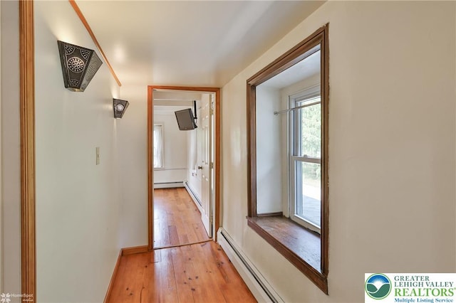 3679 Friedens Rd, Washington Twp, PA 18080 - hallway featuring light wood-type flooring, plenty of natural light, and baseboard heating