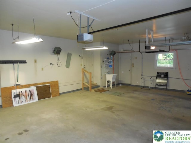 3554 Magnolia Dr, Bethlehem Twp, PA 18045 - garage featuring a garage door opener