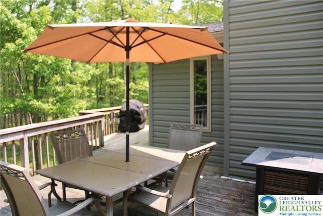 354 Kilmer Trl, Penn Forest Twp, PA 18210 - wooden deck featuring outdoor dining area