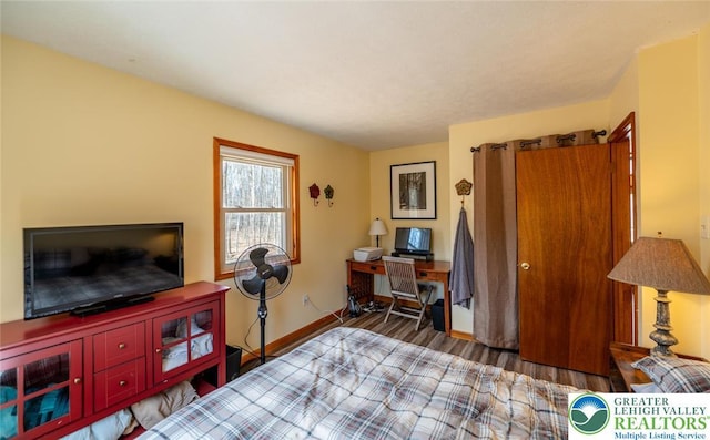 354 Kilmer Trl, Penn Forest Twp, PA 18210 - bedroom featuring wood finished floors, baseboards, and an office area